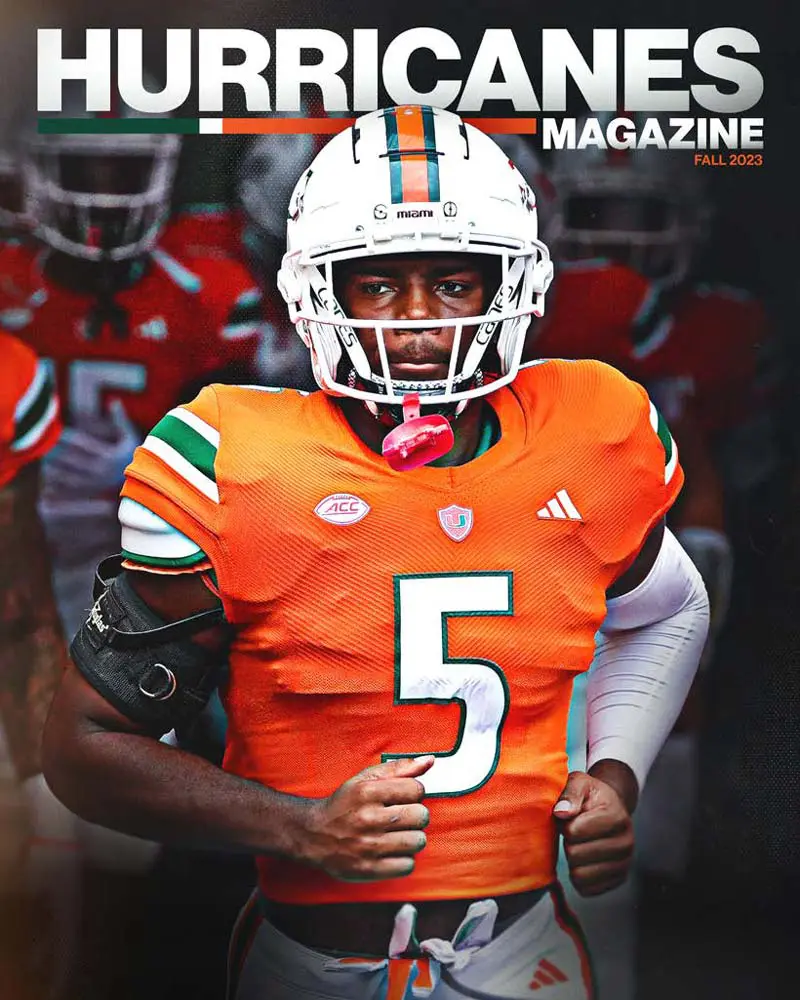 Female golfer swinging golf club