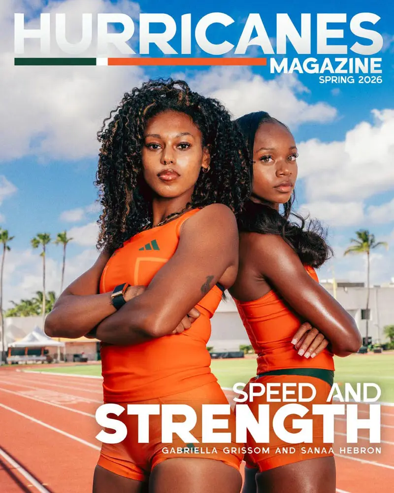 Female golfer swinging golf club