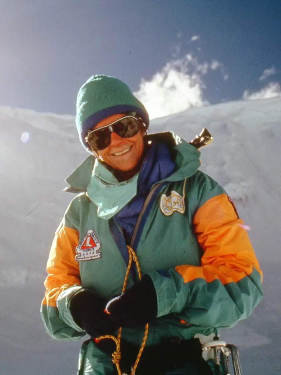 family posing with mascot