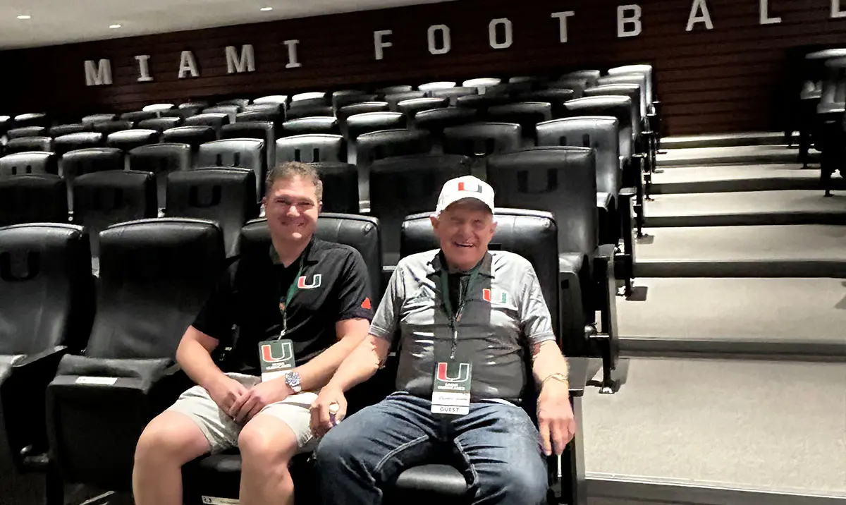 donors smiling in seats