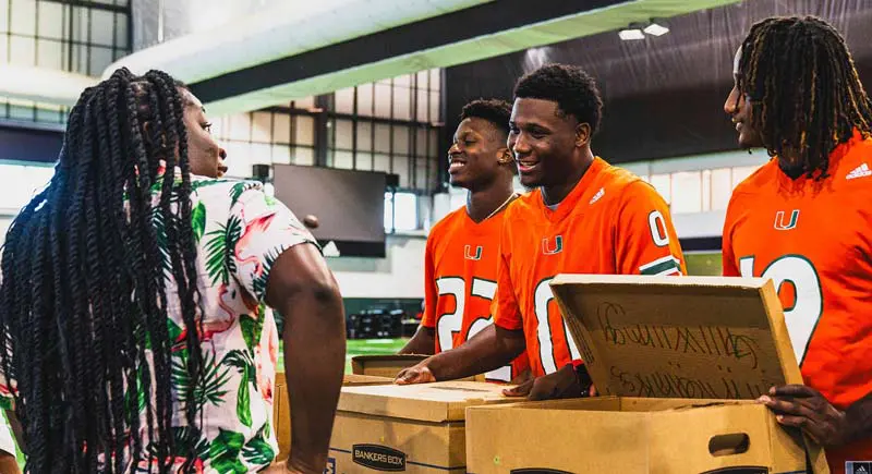  Student-athletes talking to someone