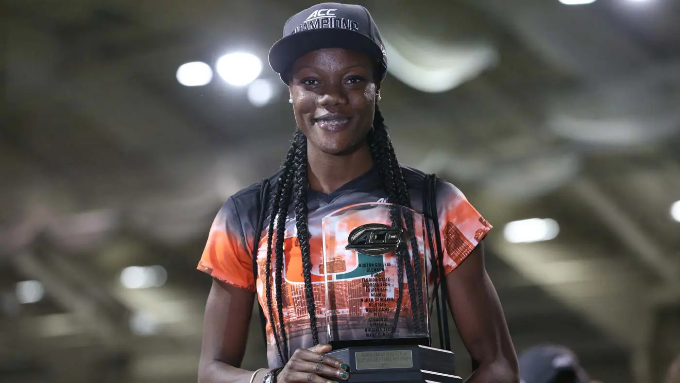 Athlete posing with trophy